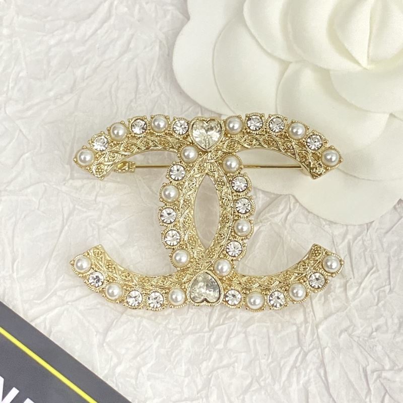 Ch**el brooches